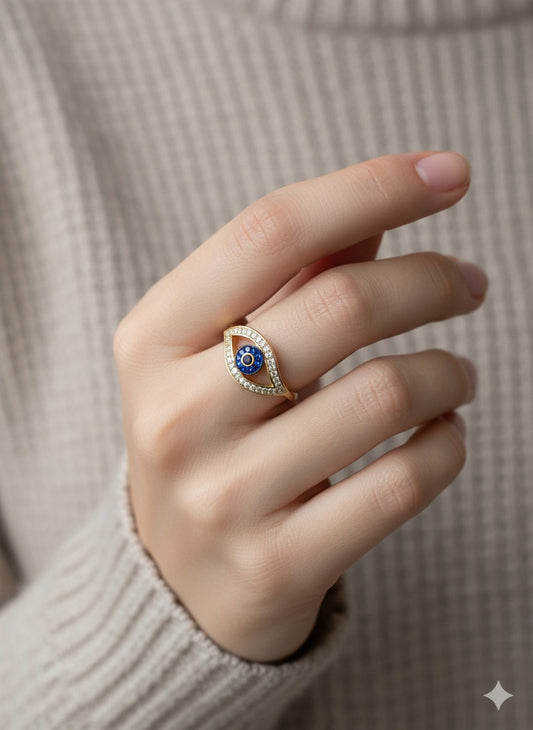 14ky Solid Gold Eye Ring With Blue and White Topaz